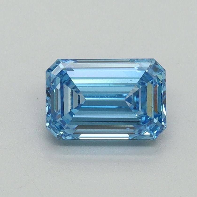 Loose Diamond - EMERALD 1.06ct Fancy Vivid Blue VS1: Loose Diamond - EMERALD 1.06ct Fancy Vivid Blue VS1 Source: This is a real non-mined Diamond that has been grown in a lab Shape: EMERALD Carats: 1.06 Color: Fancy Vivid Blue Certification: IGI Video: