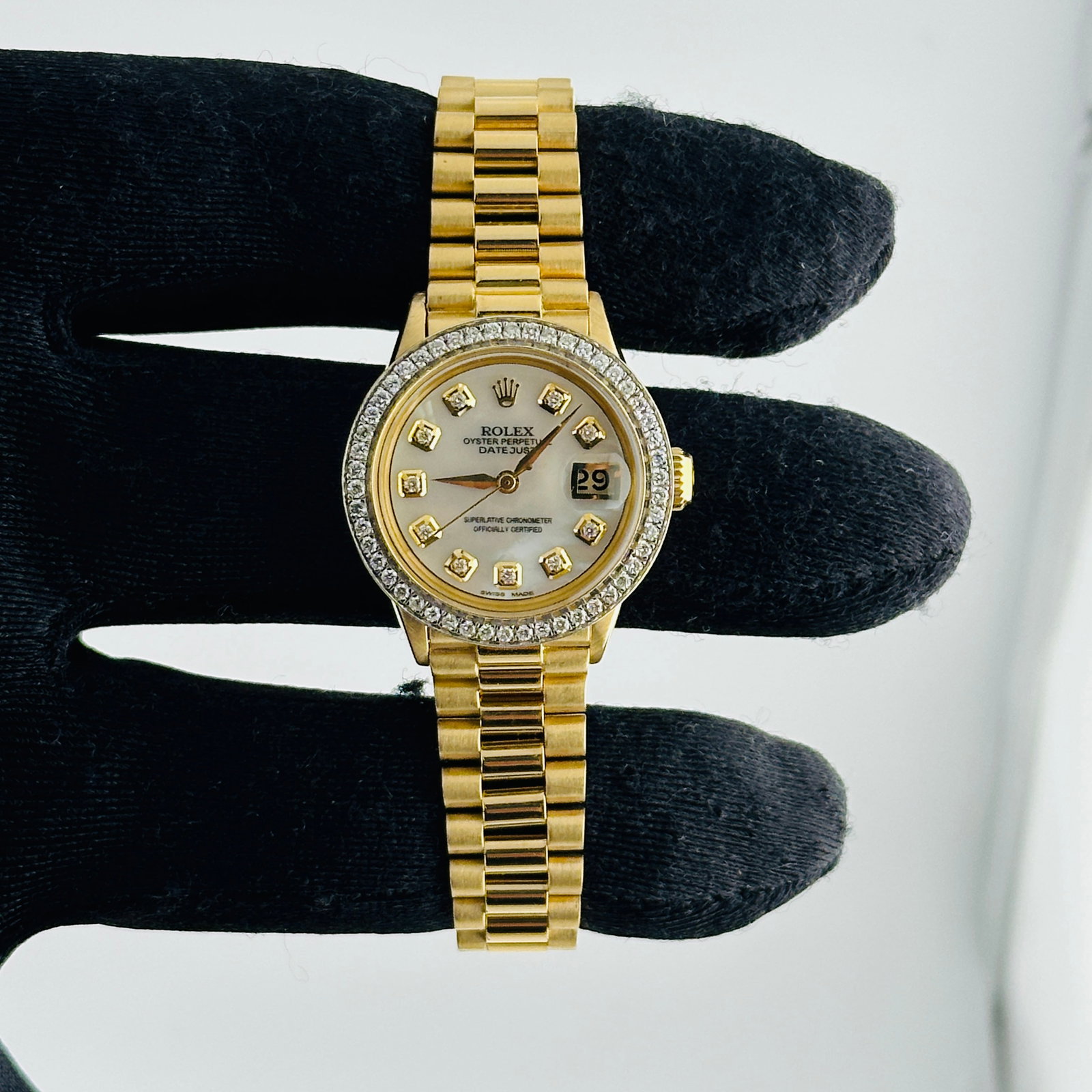 Ladies Rolex Datejust 6517 Aftermarket Diamond Mother of Pearl Dial 18K Bracelet: Ladies Rolex Datejust 6517 Aftermarket Diamond Mother of Pearl Dial 18K Bracelet This ladies Rolex Datejust President features an aftermarket white mother of pearl dial with diamond markers. The watch