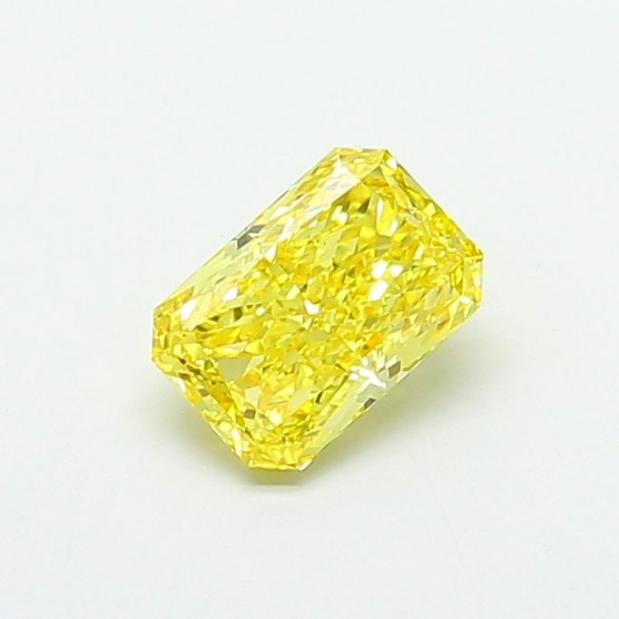Loose Diamond - RADIANT 1.55ct Fancy Vivid Yellow VS1: Loose Diamond - RADIANT 1.55ct Fancy Vivid Yellow VS1 Source: This is a real non-mined Diamond that has been grown in a lab Shape: RADIANT Carats: 1.55 Color: Fancy Vivid Yellow Certification: IGI Vid