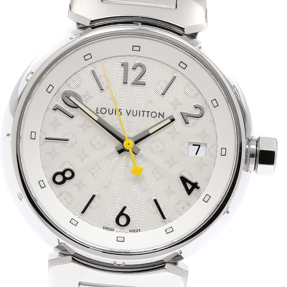Tambour Hologram Louis Vuitton quartz date ladies watch Q1313: Tambour Hologram Louis Vuitton quartz date ladies watch Q1313 This Louis Vuitton Tambour Hologram Date Quartz ladies wristwatch features a stainless steel case and band with a silver dial. The watch i