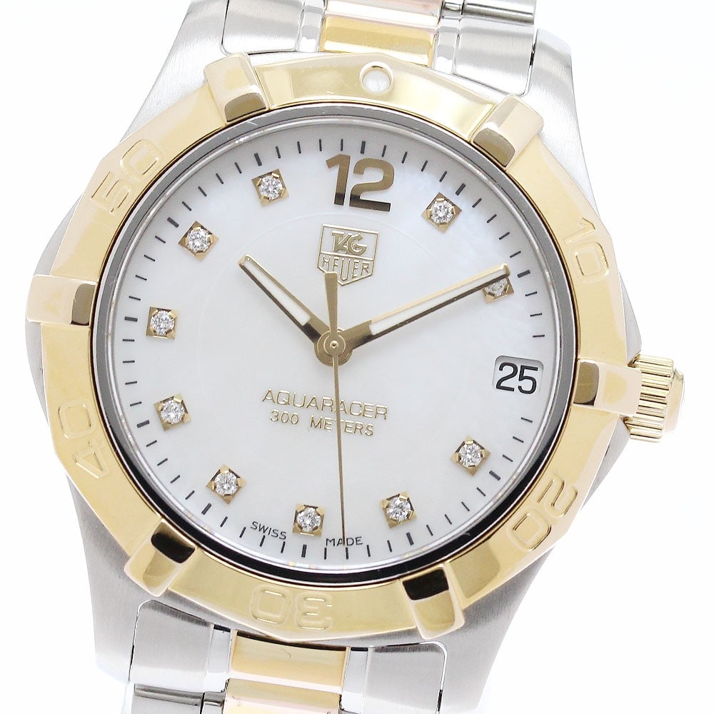 TAG Heuer Aquaracer WAF1320 Womens Quartz 10 Diamond Wristwatch: TAG Heuer Aquaracer WAF1320 Womens Quartz 10 Diamond Wristwatch Pre-owned TAG Heuer Aquaracer women's wristwatch with a quartz movement and date function. It features a white mother-of-pearl dial, sta