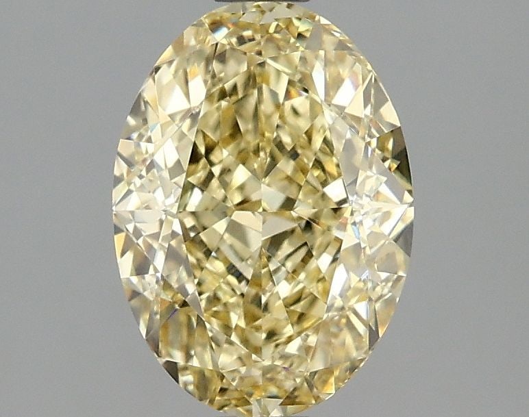 Loose Diamond - OVAL 2.08ct Fancy Intense Yellow VVS2: Loose Diamond - OVAL 2.08ct Fancy Intense Yellow VVS2 Source: This is a real non-mined Diamond that has been grown in a lab Shape: OVAL Carats: 2.08 Color: Fancy Intense Yellow Certification: IGI Vide