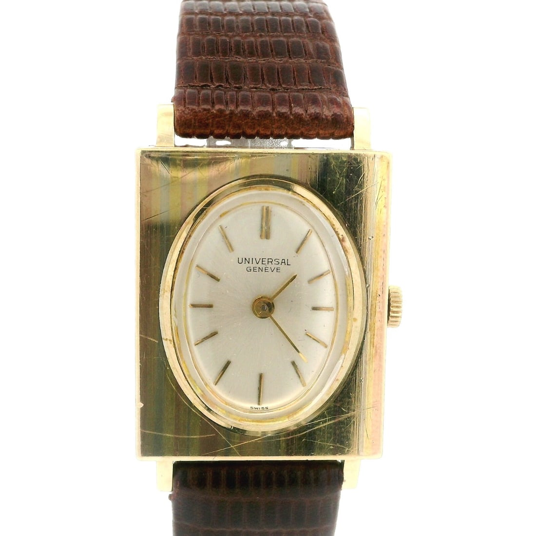Vintage Universal Geneve 14k Gold 22mm Rectangular Mechanical Watch Cal 820: Vintage Universal Geneve 14k Gold 22mm Rectangular Mechanical Watch Cal 820 Experience the elegance of vintage horology with this Universal Geneve 14k Gold Rectangular Mechanical Watch, featuring a 22