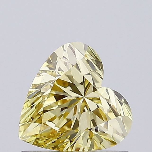 Loose Diamond - HEART 0.78ct Fancy Light Yellow VVS2: Loose Diamond - HEART 0.78ct Fancy Light Yellow VVS2 Source: This is a real non-mined Diamond that has been grown in a lab Shape: HEART Carats: 0.78 Color: Fancy Light Yellow Certification: IGI Video: