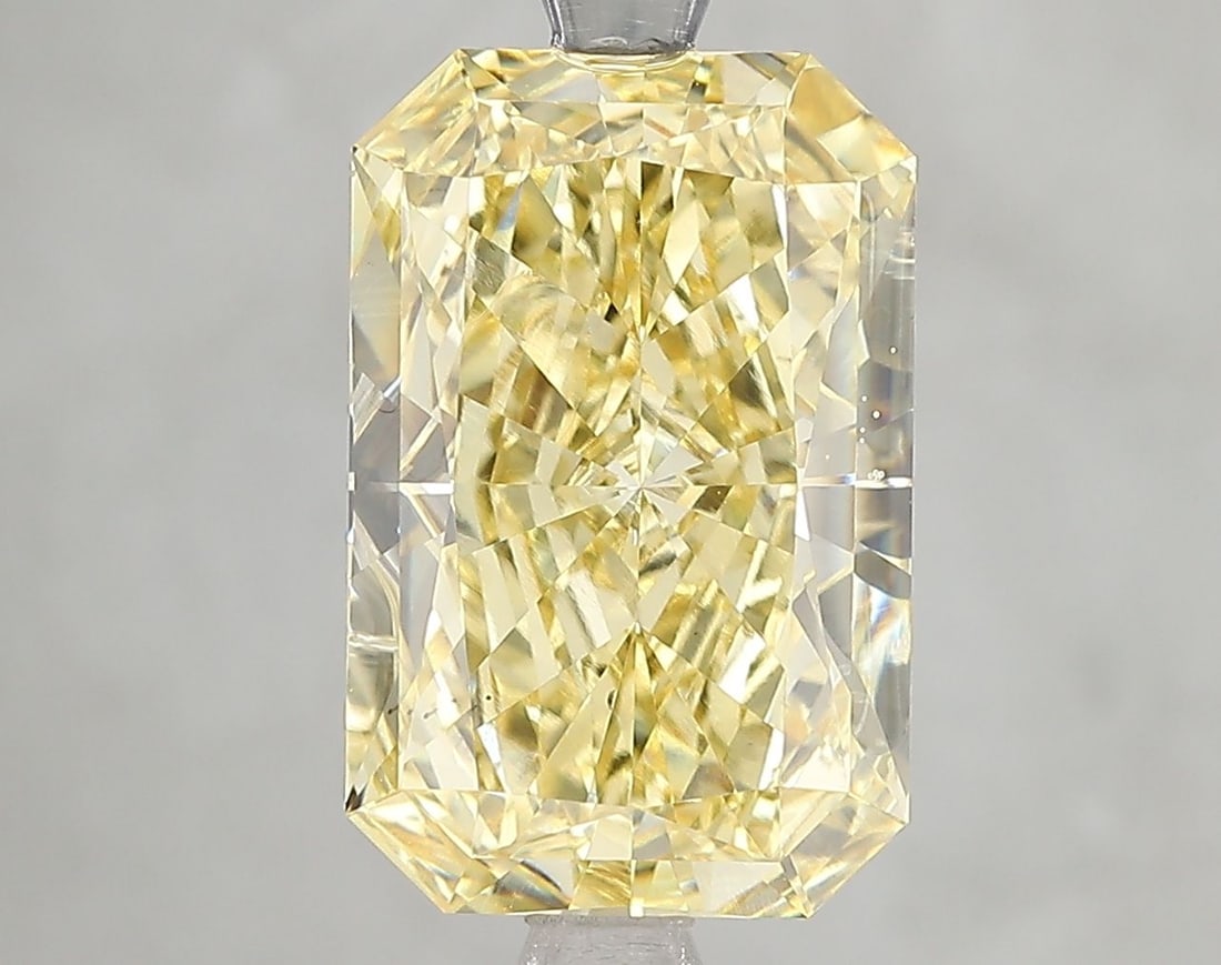 Loose Diamond - RADIANT 5.02ct Fancy Vivid Yellow VS2: Loose Diamond - RADIANT 5.02ct Fancy Vivid Yellow VS2 Source: This is a real non-mined Diamond that has been grown in a lab Shape: RADIANT Carats: 5.02 Color: Fancy Vivid Yellow Certification: IGI Vid