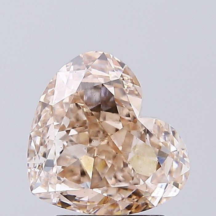 Loose Diamond - HEART 2.2ct Fancy Light Brown VS1: Loose Diamond - HEART 2.2ct Fancy Light Brown VS1 Source: This is a real non-mined Diamond that has been grown in a lab Shape: HEART Carats: 2.2 Color: Fancy Light Brown Certification: IGI Video: