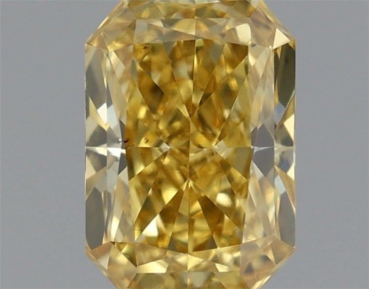 Loose Diamond - RADIANT 0.39ct Fancy Vivid Yellow VS1: Loose Diamond - RADIANT 0.39ct Fancy Vivid Yellow VS1 Source: This is a real non-mined Diamond that has been grown in a lab Shape: RADIANT Carats: 0.39 Color: Fancy Vivid Yellow Certification: IGI Vid