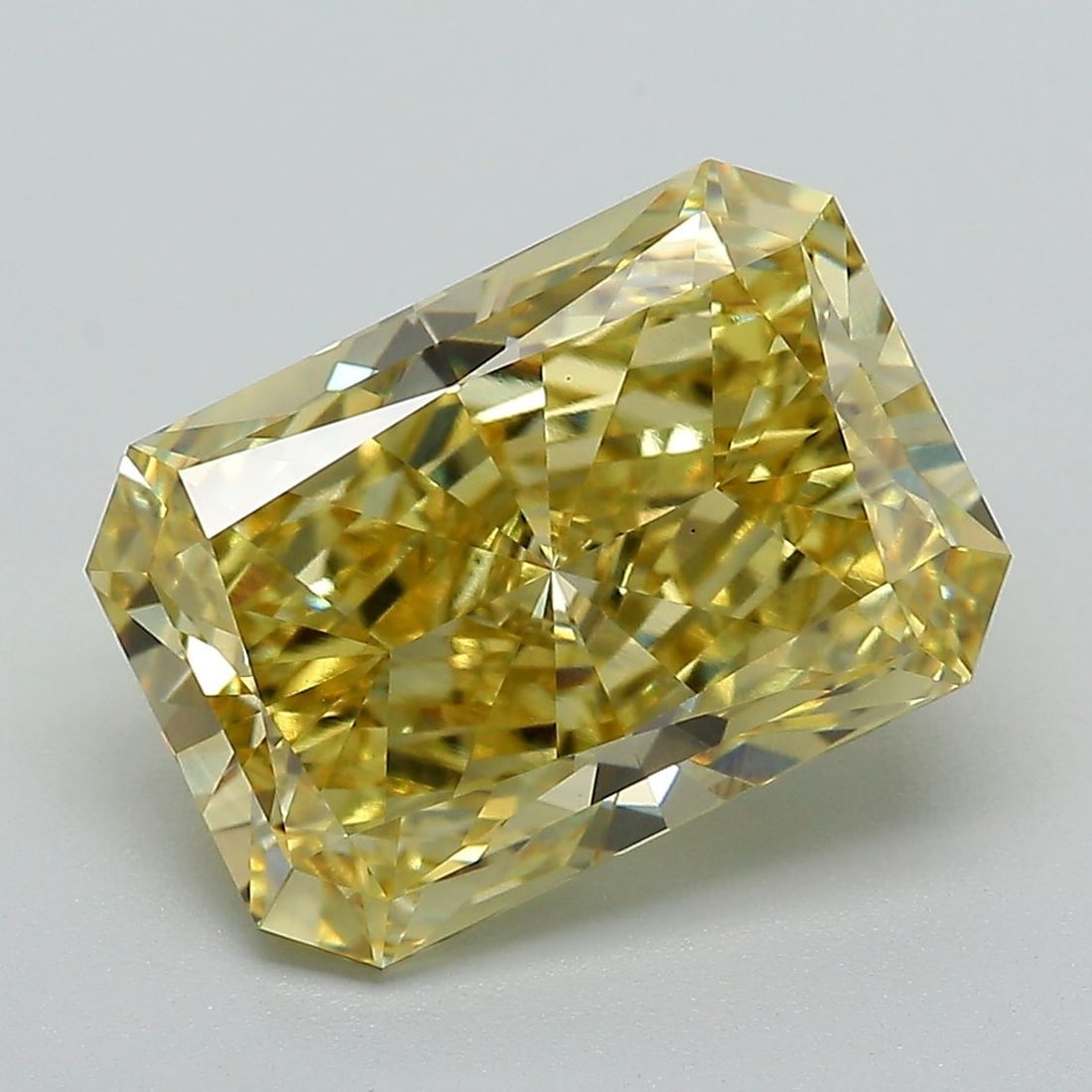 Loose Diamond - RADIANT 5.04ct Fancy Vivid Yellow VS1: Loose Diamond - RADIANT 5.04ct Fancy Vivid Yellow VS1 Source: This is a real non-mined Diamond that has been grown in a lab Shape: RADIANT Carats: 5.04 Color: Fancy Vivid Yellow Certification: IGI Vid