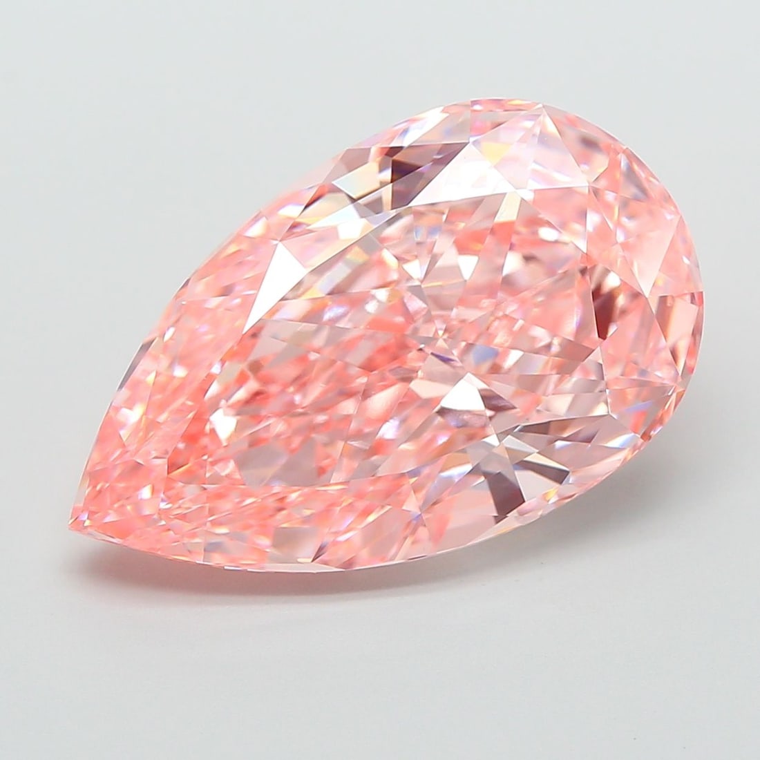 Loose Diamond - PEAR 10.01ct Fancy Vivid Pink VVS2: Loose Diamond - PEAR 10.01ct Fancy Vivid Pink VVS2 Source: This is a real non-mined Diamond that has been grown in a lab Shape: PEAR Carats: 10.01 Color: Fancy Vivid Pink Certification: IGI Video: