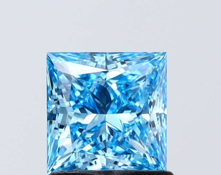 Loose Diamond - PRINCESS 1.1ct Fancy Vivid Blue VS1: Loose Diamond - PRINCESS 1.1ct Fancy Vivid Blue VS1 Source: This is a real non-mined Diamond that has been grown in a lab Shape: PRINCESS Carats: 1.1 Color: Fancy Vivid Blue Certification: IGI Video: