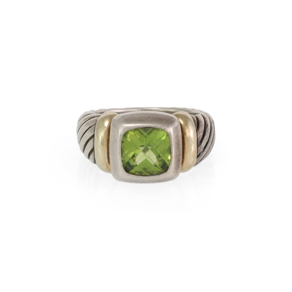 David Yurman Albion 14k Gold Sterling Silver Peridot Ring: David Yurman Albion 14k Gold Sterling Silver Peridot Ring This exquisite David Yurman Albion ring showcases a stunning cushion-shaped peridot gemstone, measuring 7.5mm x 7.5mm, beautifully set within