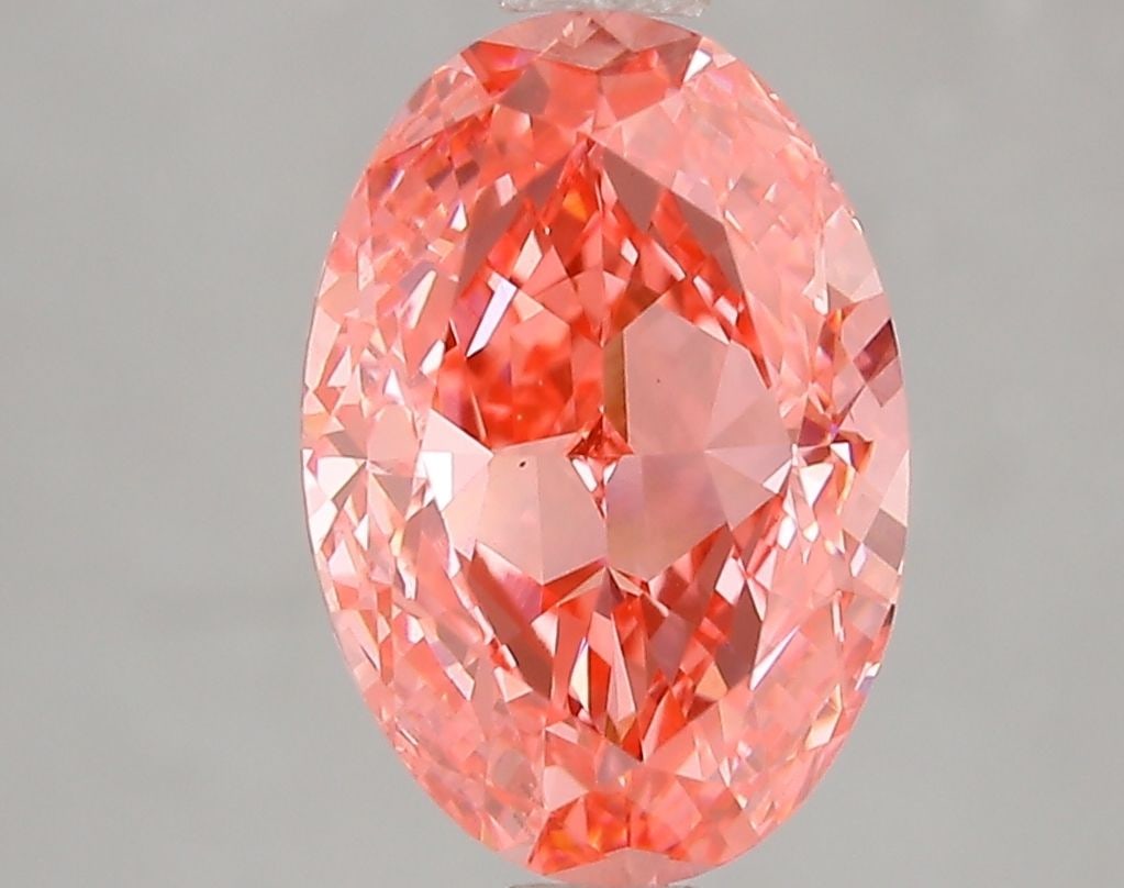 Loose Diamond - OVAL 3.01ct Fancy Vivid Pink VS2: Loose Diamond - OVAL 3.01ct Fancy Vivid Pink VS2 Source: This is a real non-mined Diamond that has been grown in a lab Shape: OVAL Carats: 3.01 Color: Fancy Vivid Pink Certification: IGI Video: