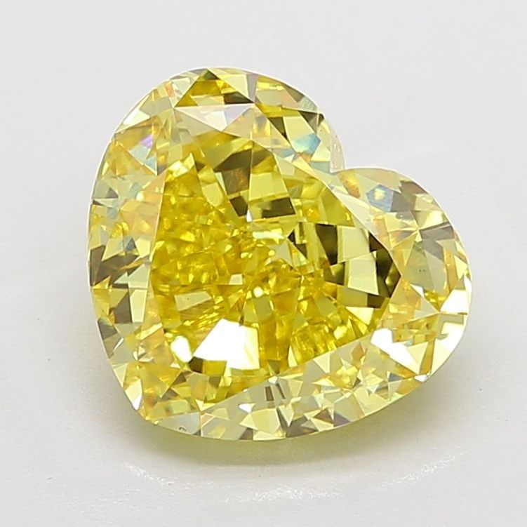 Loose Diamond - HEART 6.58ct Fancy Vivid Yellow VS1: Loose Diamond - HEART 6.58ct Fancy Vivid Yellow VS1 Source: This is a real non-mined Diamond that has been grown in a lab Shape: HEART Carats: 6.58 Color: Fancy Vivid Yellow Certification: IGI Video: