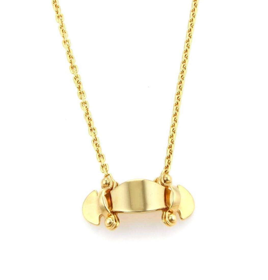 Louis Vuitton Stand By Me 18k Gold Pendant Chain Necklace: Louis Vuitton Stand By Me 18k Gold Pendant Chain Necklace Authentic Louis Vuitton Stand By Me pendant necklace crafted in solid 18k yellow gold. This signed necklace features a geometric branded penda