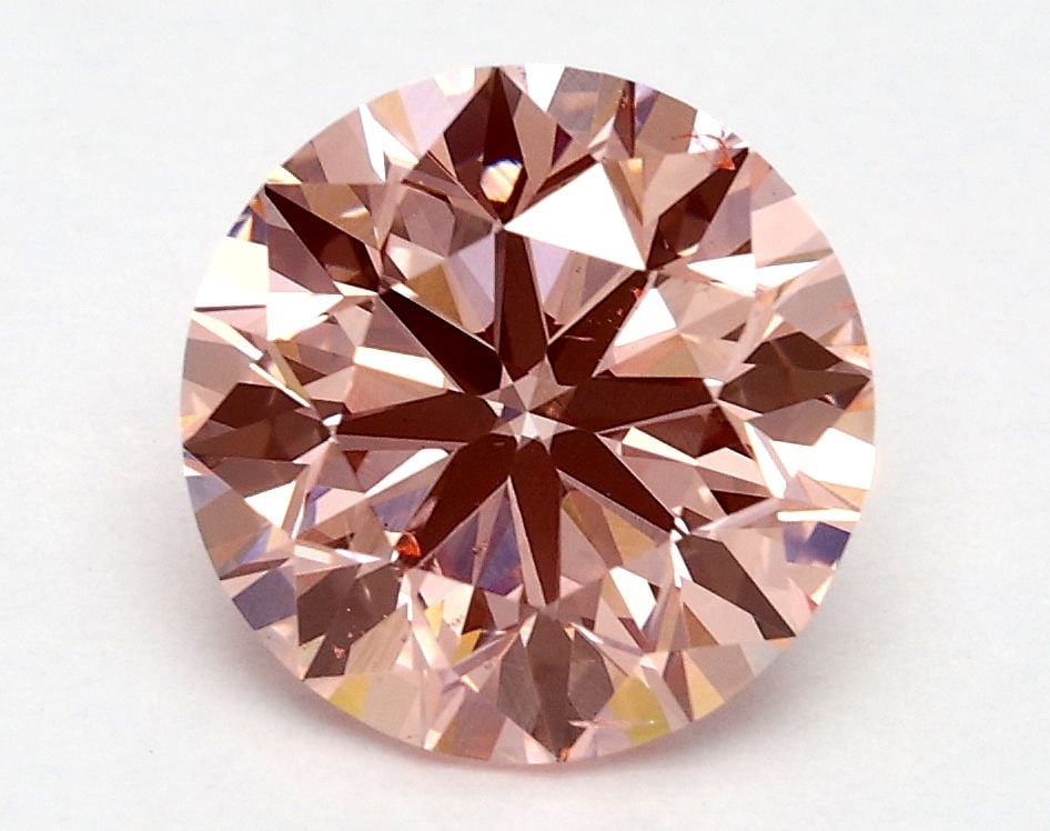 Loose Diamond - ROUND 1.71ct Fancy Vivid Pink SI1: Loose Diamond - ROUND 1.71ct Fancy Vivid Pink SI1 Source: This is a real non-mined Diamond that has been grown in a lab Shape: ROUND Carats: 1.71 Color: Fancy Vivid Pink Certification: IGI Video: