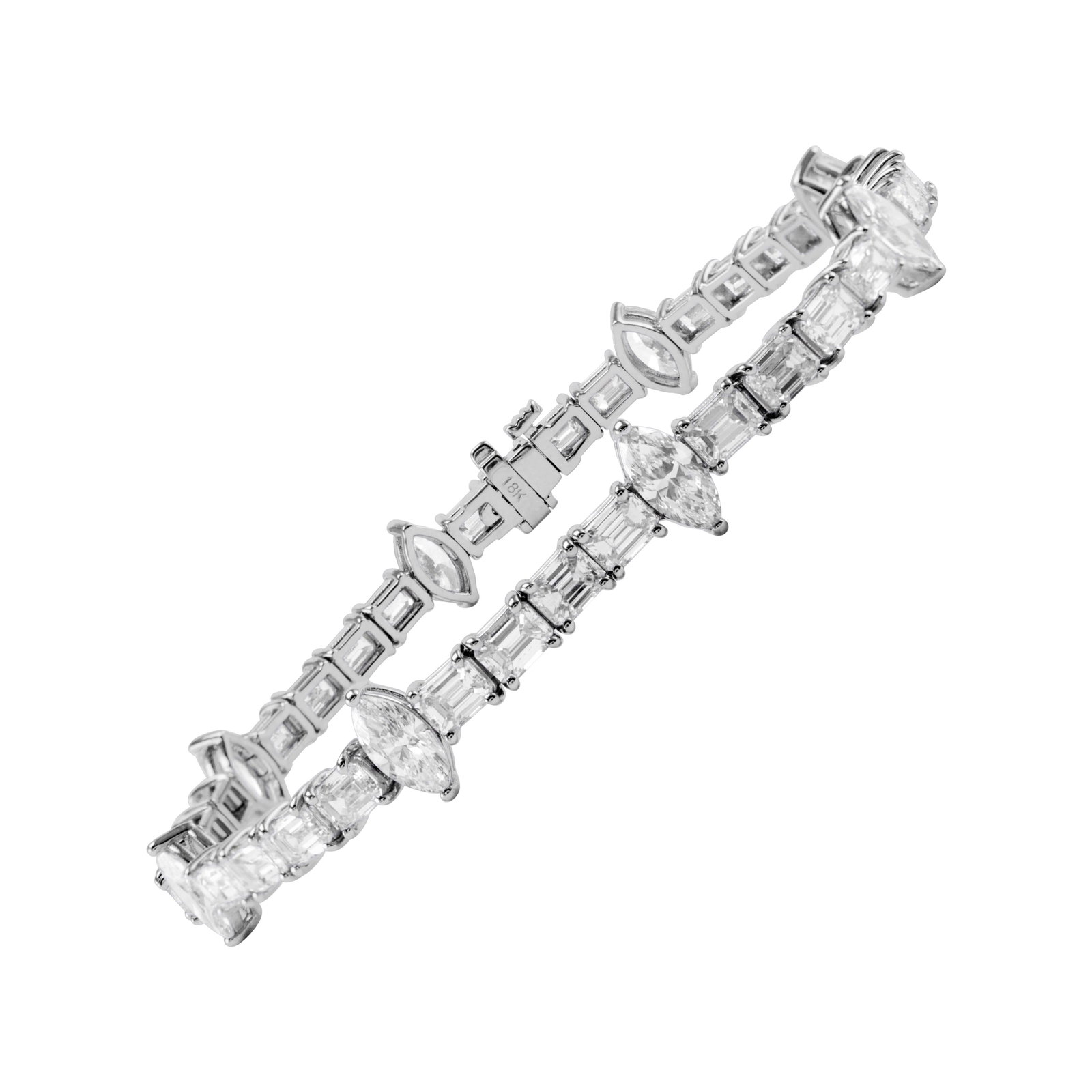 12.77ct Diamond Tennis Bracelet in 18k White Gold: 12.77ct Diamond Tennis Bracelet in 18k White Gold Experience the elegance of this stunning 12.77ct Emerald Cut & Marquise Diamond Tennis Bracelet. Crafted in luxurious 18k white gold, this contemporar
