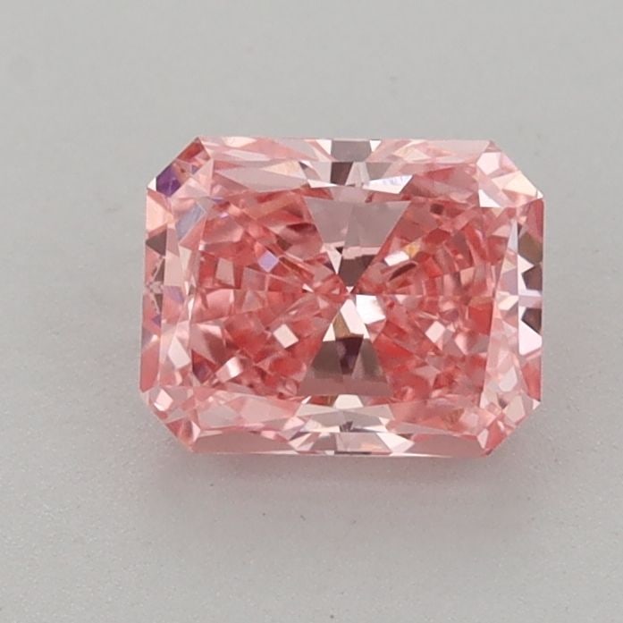 Loose Diamond - RADIANT 0.97ct Fancy Vivid Pink VS2: Loose Diamond - RADIANT 0.97ct Fancy Vivid Pink VS2 Source: This is a real non-mined Diamond that has been grown in a lab Shape: RADIANT Carats: 0.97 Color: Fancy Vivid Pink Certification: IGI Video:
