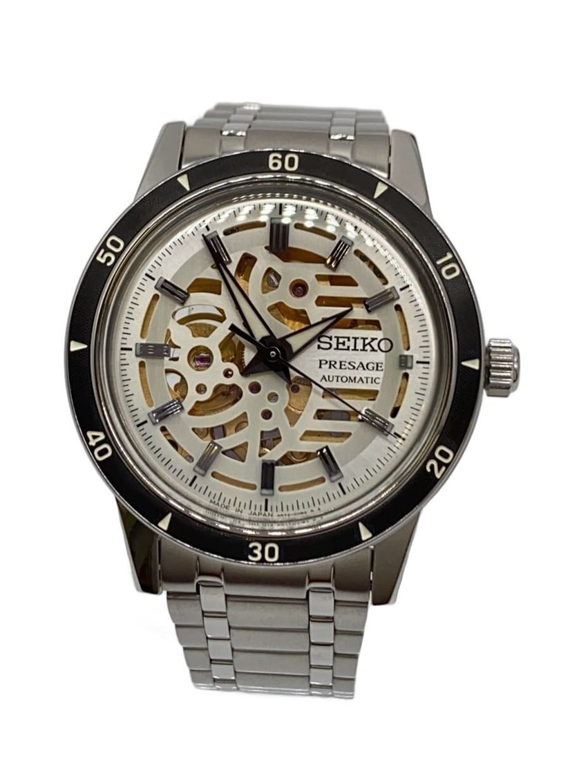 Seiko Presage Style 60s Open Heart Stainless Steel Men's Wristwatch: Seiko Presage Style 60s Open Heart Stainless Steel Men's Wristwatch This Seiko Presage Style 60s Open Heart SARY255 men's wristwatch features a stainless steel case and band in a silver tone. Made in 