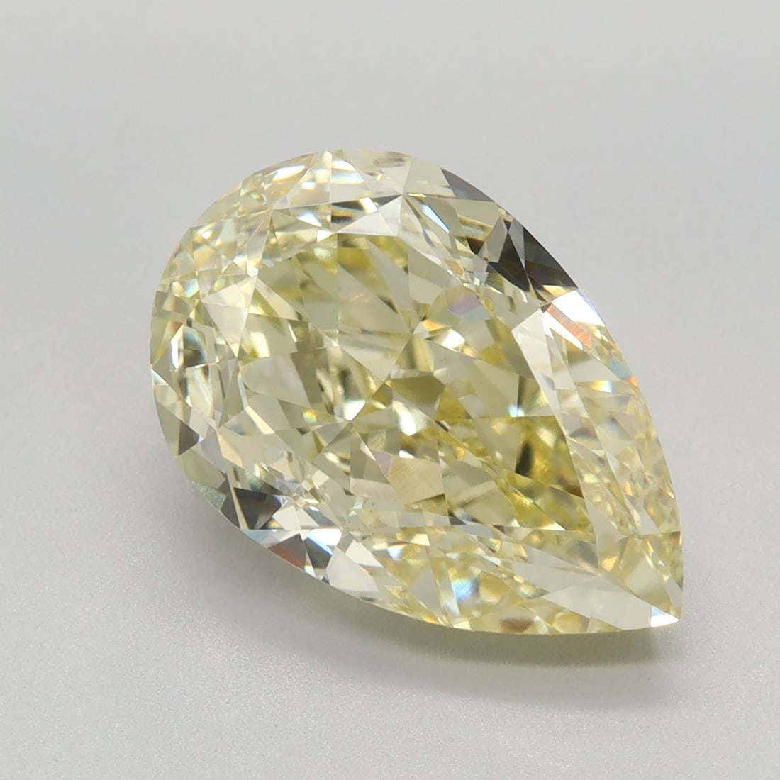 Loose Diamond - PEAR 4.59ct Fancy Intense Yellow VVS2: Loose Diamond - PEAR 4.59ct Fancy Intense Yellow VVS2 Source: This is a real non-mined Diamond that has been grown in a lab Shape: PEAR Carats: 4.59 Color: Fancy Intense Yellow Certification: IGI Vide