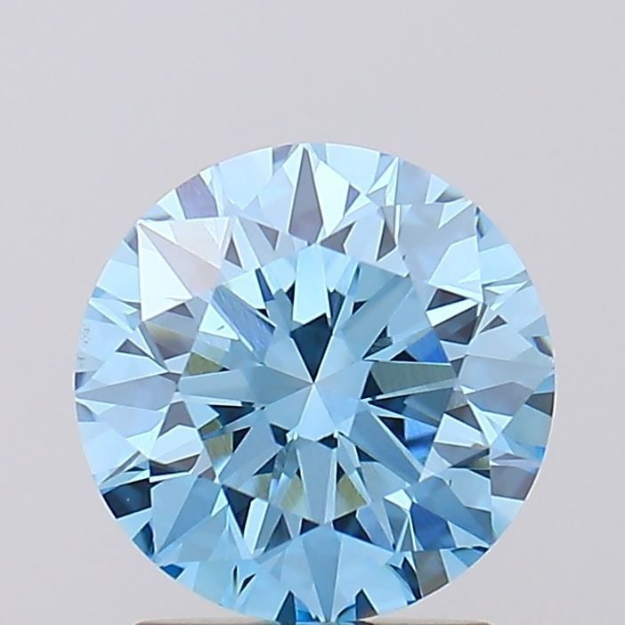Ideal Loose Diamond - ROUND 1.74ct Fancy Vivid Blue VVS2: Ideal Loose Diamond - ROUND 1.74ct Fancy Vivid Blue VVS2 Source: This is a real non-mined Diamond that has been grown in a lab Shape: ROUND Carats: 1.74 Color: Fancy Vivid Blue Certification: IGI Vide
