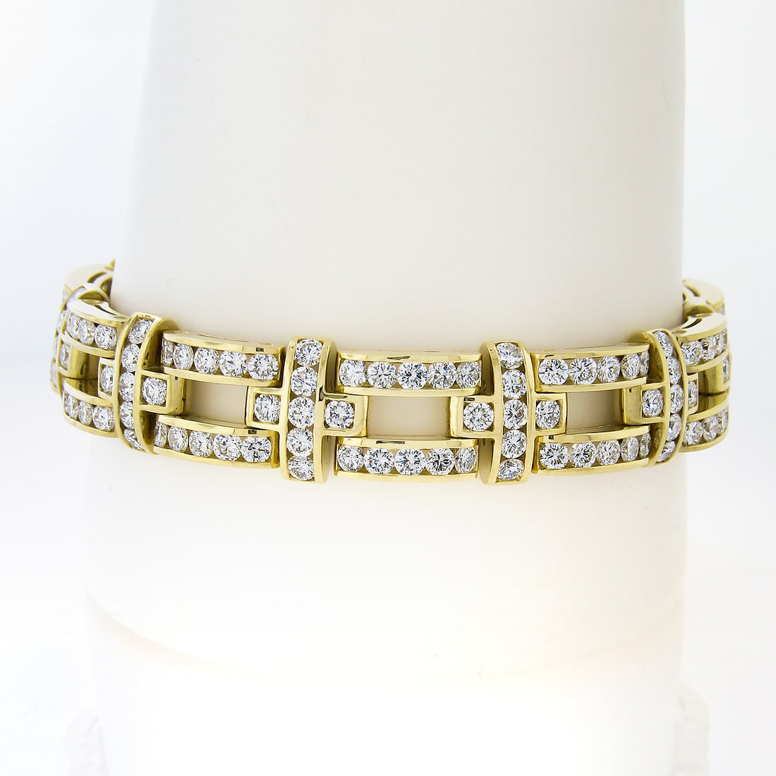 18K Yellow Gold 14.9ctw Channel Set Diamond Wide Link Bracelet: 18K Yellow Gold 14.9ctw Channel Set Diamond Wide Link Bracelet This exquisite Unisex 18K Gold 14.9ctw Channel Set Diamond Wide Link Statement Bracelet is crafted from solid 18k yellow gold and