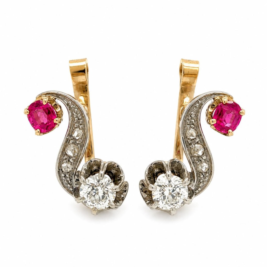 Edwardian dangle earrings in 17-18k gold palladium with old cut diamonds: Edwardian dangle earrings in 17-18k gold palladium with old cut diamonds Antique Edwardian swirl drop earrings featuring natural old cut diamonds in a graceful dangle design. Crafted in solid yellow g