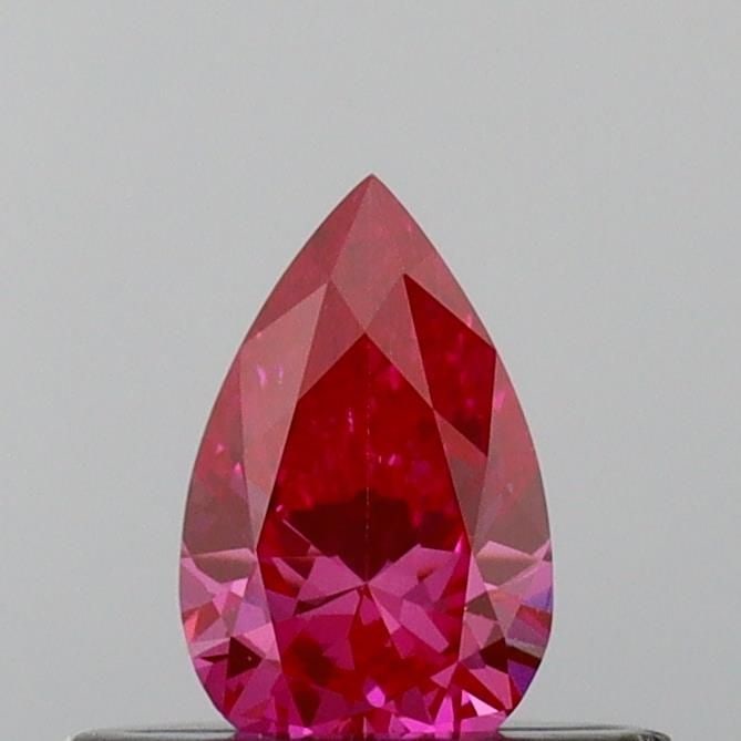Loose Diamond - PEAR 0.31ct Fancy Vivid Pink VVS2: Loose Diamond - PEAR 0.31ct Fancy Vivid Pink VVS2 Source: This is a real non-mined Diamond that has been grown in a lab Shape: PEAR Carats: 0.31 Color: Fancy Vivid Pink Certification: IGI Video: