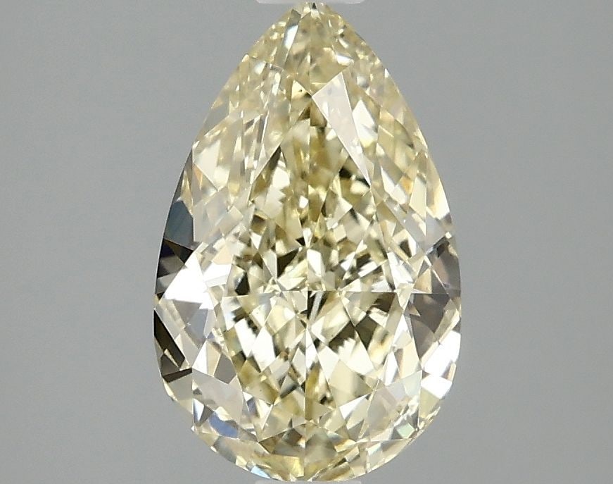 Loose Diamond - PEAR 2.06ct Fancy Yellow VS1: Loose Diamond - PEAR 2.06ct Fancy Yellow VS1 Source: This is a real non-mined Diamond that has been grown in a lab Shape: PEAR Carats: 2.06 Color: Fancy Yellow Certification: IGI Video: