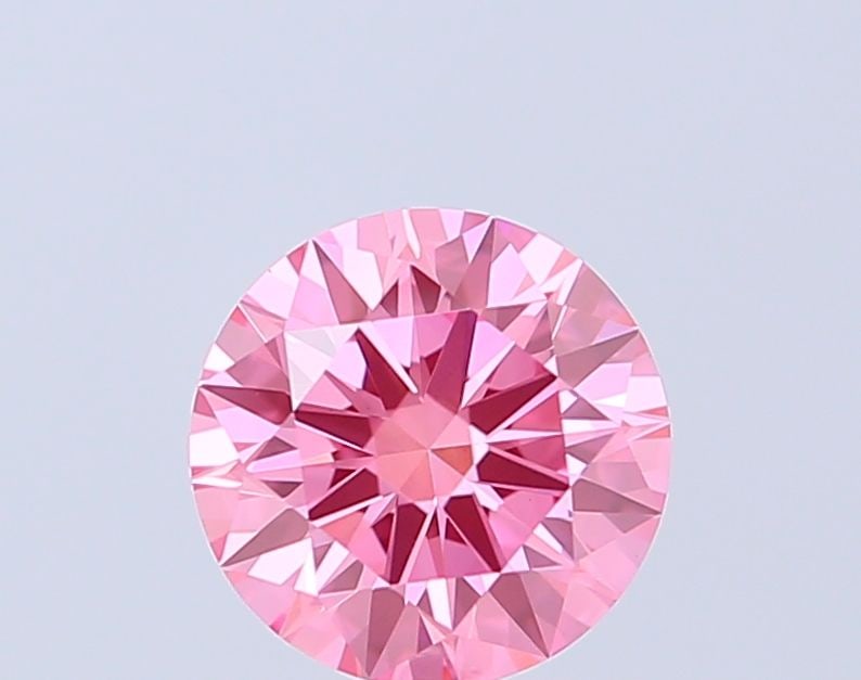 Ideal Loose Diamond - ROUND 1.08ct Fancy Vivid Pink VVS2: Ideal Loose Diamond - ROUND 1.08ct Fancy Vivid Pink VVS2 Source: This is a real non-mined Diamond that has been grown in a lab Shape: ROUND Carats: 1.08 Color: Fancy Vivid Pink Certification: IGI