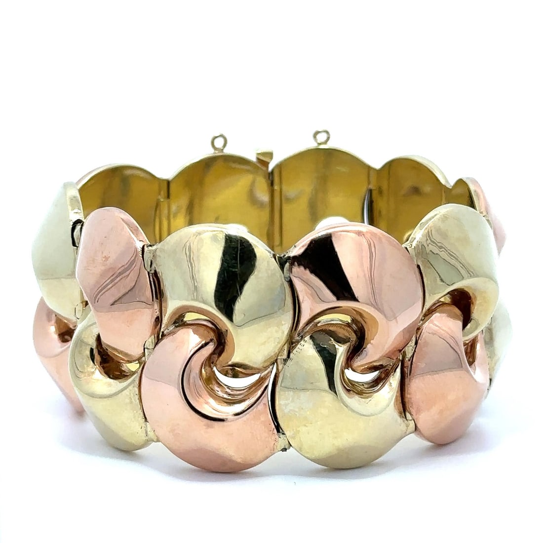 Wide 14k Rose and Green Gold Crescent Link Vintage Bracelet: Wide 14k Rose and Green Gold Crescent Link Vintage Bracelet This vintage retro bracelet features an interlocking wide puffed crescent link design crafted from solid 14k rose and green gold. The bracel