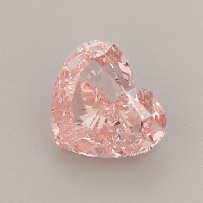 Loose Diamond - HEART 0.85ct Fancy Vivid Pink VS2: Loose Diamond - HEART 0.85ct Fancy Vivid Pink VS2 Source: This is a real non-mined Diamond that has been grown in a lab Shape: HEART Carats: 0.85 Color: Fancy Vivid Pink Certification: IGI Video: