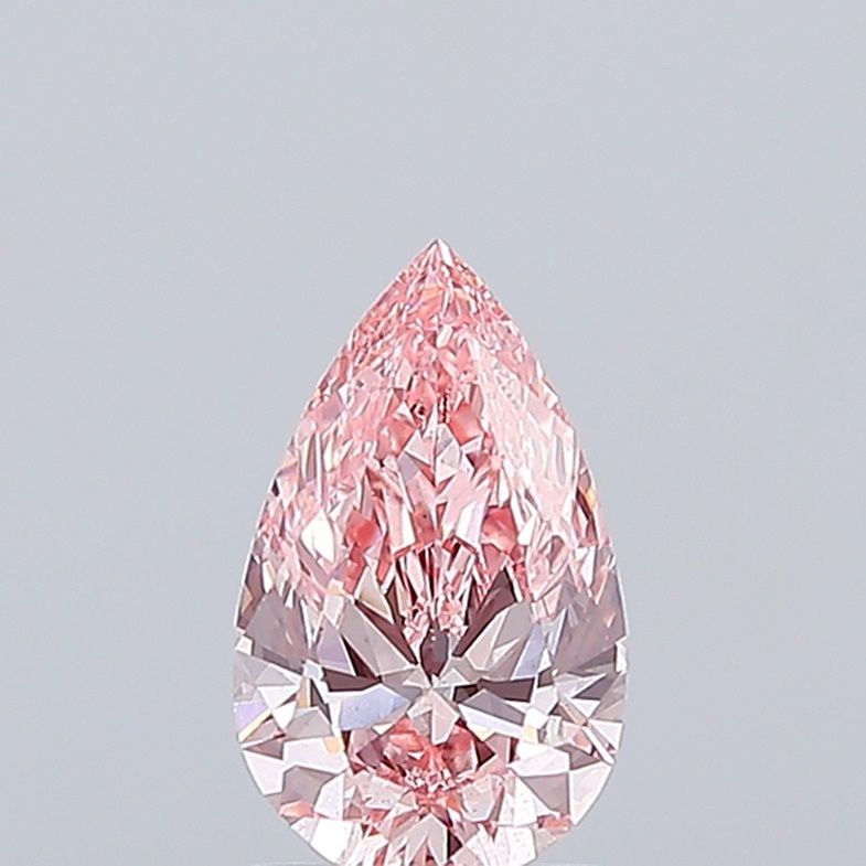 Loose Diamond - PEAR 1.5ct Fancy Vivid Pink VS2: Loose Diamond - PEAR 1.5ct Fancy Vivid Pink VS2 Source: This is a real non-mined Diamond that has been grown in a lab Shape: PEAR Carats: 1.5 Color: Fancy Vivid Pink Certification: IGI Video: