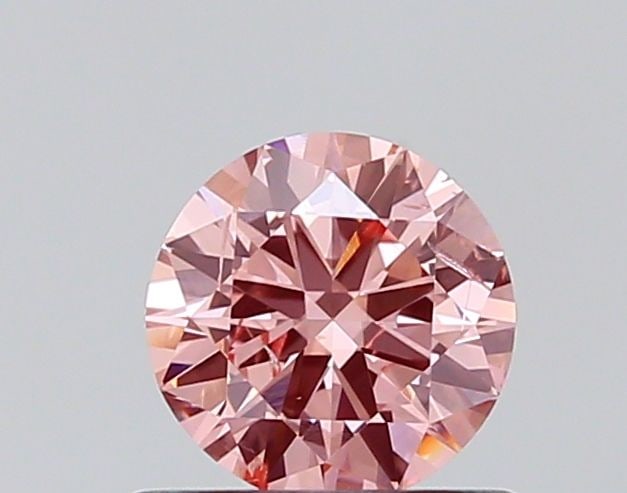 Loose Diamond - ROUND 0.55ct Fancy Vivid Pink SI2: Loose Diamond - ROUND 0.55ct Fancy Vivid Pink SI2 Source: This is a real non-mined Diamond that has been grown in a lab Shape: ROUND Carats: 0.55 Color: Fancy Vivid Pink Certification: NONE The Diamon
