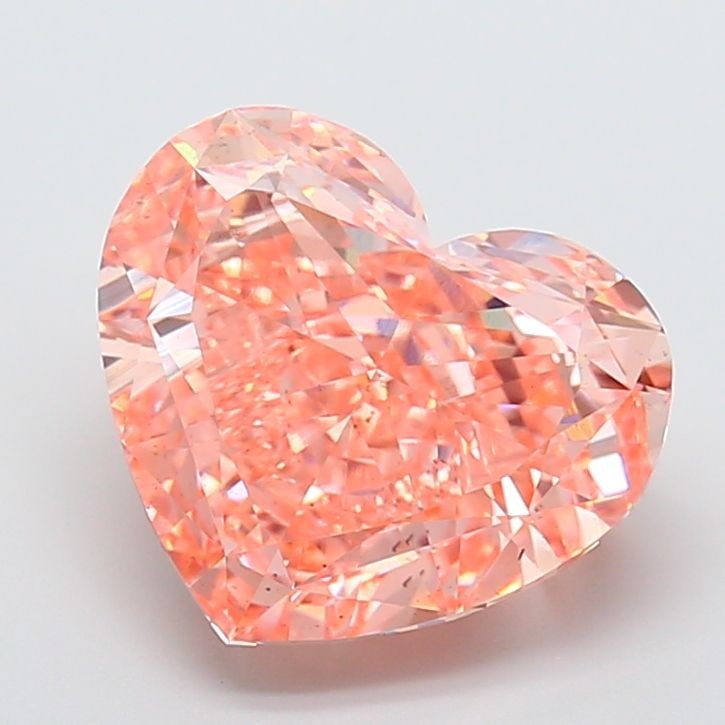 Loose Diamond - HEART 10.04ct Fancy Vivid Orangey Pink VS2: Loose Diamond - HEART 10.04ct Fancy Vivid Orangey Pink VS2 Source: This is a real non-mined Diamond that has been grown in a lab Shape: HEART Carats: 10.04 Color: Fancy Vivid Orangey Pink Certificatio
