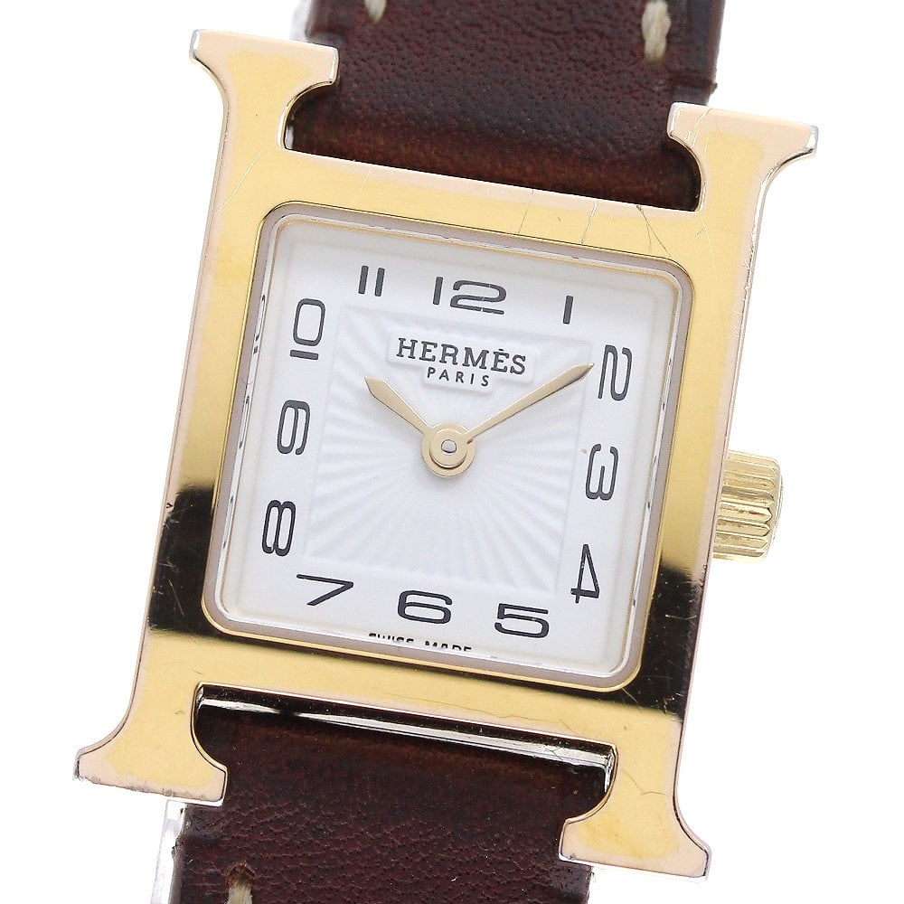 Hermes H-Watch Mini HH1.101 women's quartz wristwatch: Hermes H-Watch Mini HH1.101 women's quartz wristwatch Pre-owned Hermes HH1.101 H-Watch Mini quartz women's wristwatch. Swiss-made and designed for women, this timepiece is presented in pre-owned condi