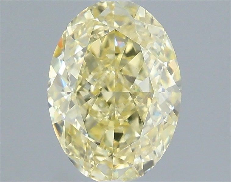 Loose Diamond - OVAL 1.06ct Fancy Yellow VVS2: Loose Diamond - OVAL 1.06ct Fancy Yellow VVS2 Source: This is a real non-mined Diamond that has been grown in a lab Shape: OVAL Carats: 1.06 Color: Fancy Yellow Certification: IGI Video: