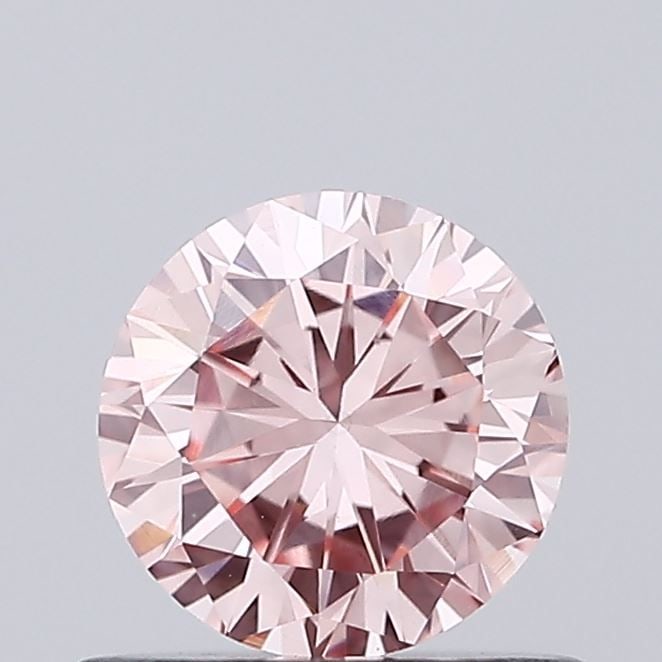 Loose Diamond - ROUND 0.61ct Fancy Intense Pink VS1: Loose Diamond - ROUND 0.61ct Fancy Intense Pink VS1 Source: This is a real non-mined Diamond that has been grown in a lab Shape: ROUND Carats: 0.61 Color: Fancy Intense Pink Certification: IGI Video: