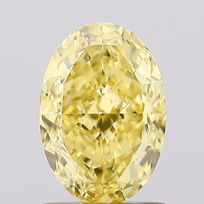 Loose Diamond - OVAL 1.4ct Fancy Vivid Yellow VS1: Loose Diamond - OVAL 1.4ct Fancy Vivid Yellow VS1 Source: This is a real non-mined Diamond that has been grown in a lab Shape: OVAL Carats: 1.4 Color: Fancy Vivid Yellow Certification: IGI Video: