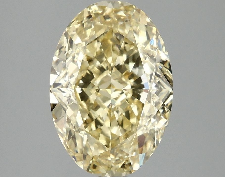 Loose Diamond - OVAL 3.1ct Fancy Vivid Yellow VS1: Loose Diamond - OVAL 3.1ct Fancy Vivid Yellow VS1 Source: This is a real non-mined Diamond that has been grown in a lab Shape: OVAL Carats: 3.1 Color: Fancy Vivid Yellow Certification: IGI Video: