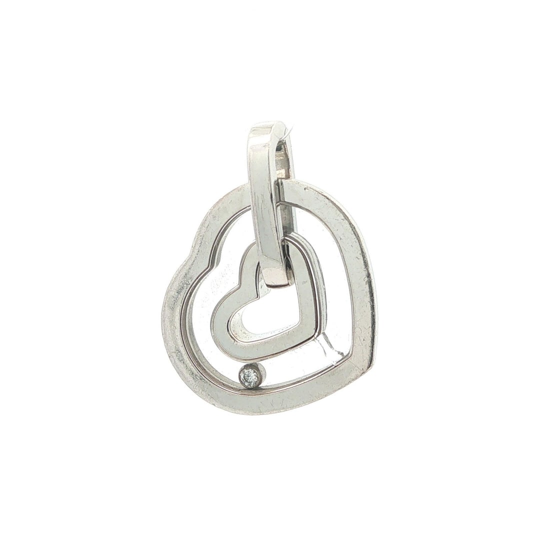 Chopard Happy Diamond double heart white gold pendant: Chopard Happy Diamond double heart white gold pendant Pre-owned Chopard Happy Diamond large double heart floating pendant in solid 17-18k white gold. This women's pendant features one natural round br