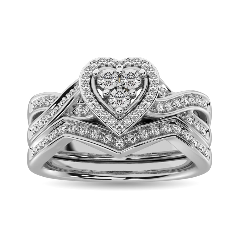 Diamond Bridal Ring 1/5 Ct.tw in Round-cut 10K in White Gold: Diamond Bridal Ring 1/5 Ct.tw in Round-cut 10K in White Gold This vintage-inspired heart bridal set with round diamonds. Crafted in beautiful 10K white gold, the set has a total diamond weight of 1/5 