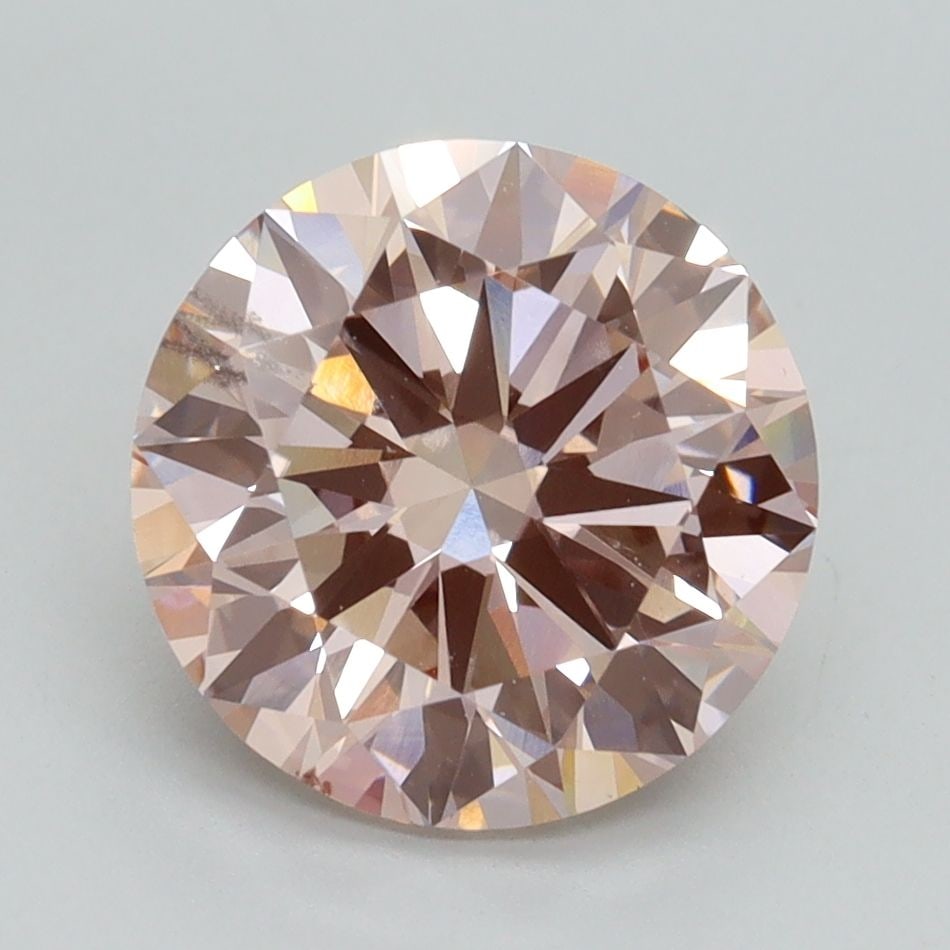 Loose Diamond - ROUND 3.01ct Fancy Light Pink VS2: Loose Diamond - ROUND 3.01ct Fancy Light Pink VS2 Source: This is a real non-mined Diamond that has been grown in a lab Shape: ROUND Carats: 3.01 Color: Fancy Light Pink Certification: IGI Video: