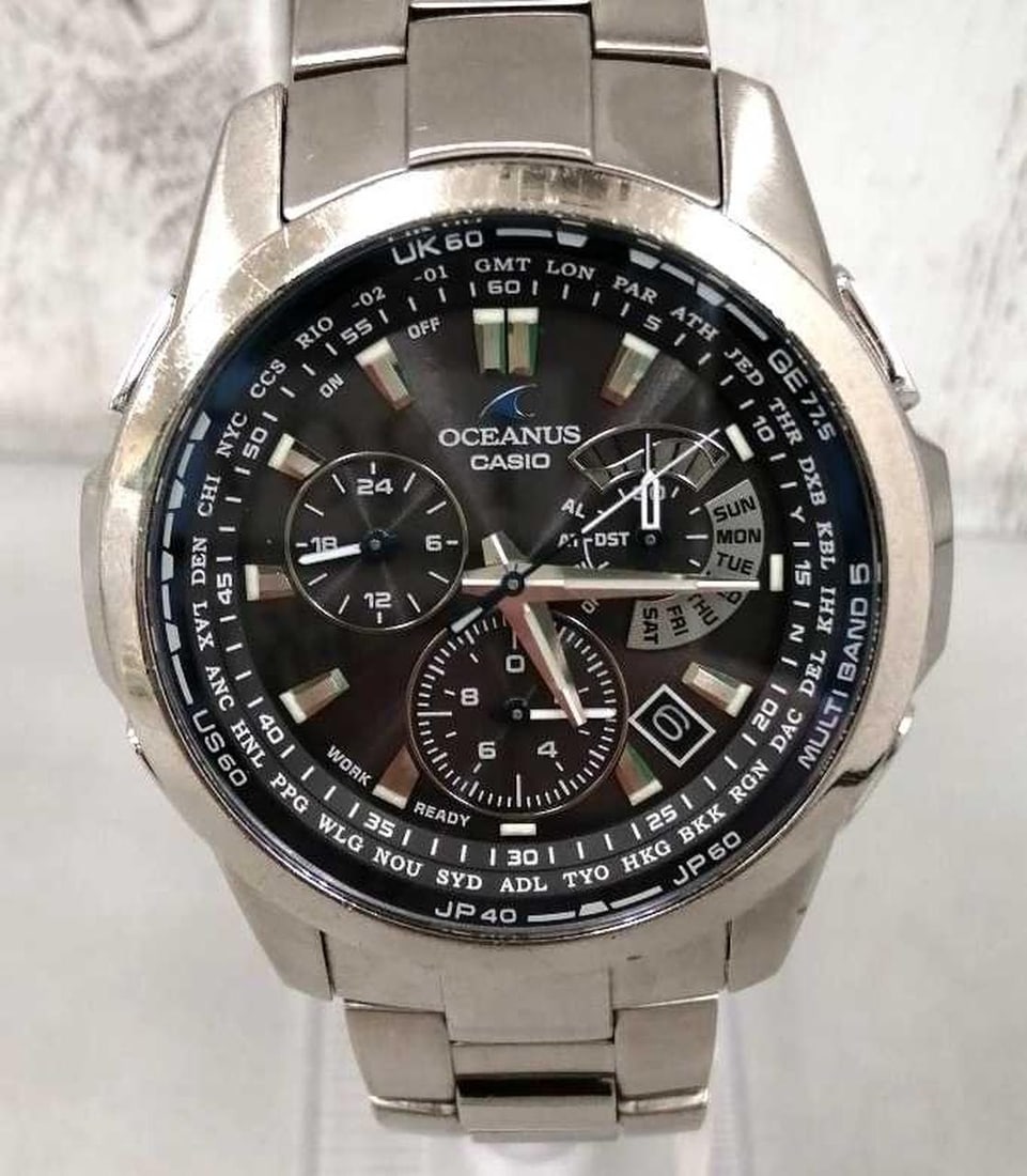 CASIO OCW-M700 Oceanus mens titanium solar radio watch: CASIO OCW-M700 Oceanus mens titanium solar radio watch Pre-owned Casio Oceanus OCW-M700 men's wristwatch with a solar-powered, radio-controlled quartz movement. This Japan-made watch features a titani