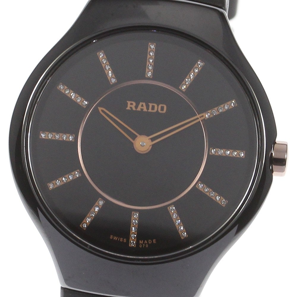 RADO True Thin Line Quartz Ceramic Ladies Watch 30mm: RADO True Thin Line Quartz Ceramic Ladies Watch 30mm This RADO True Thin Line women's wristwatch features a sleek black ceramic case paired with a comfortable rubber strap. The watch is powered by a q