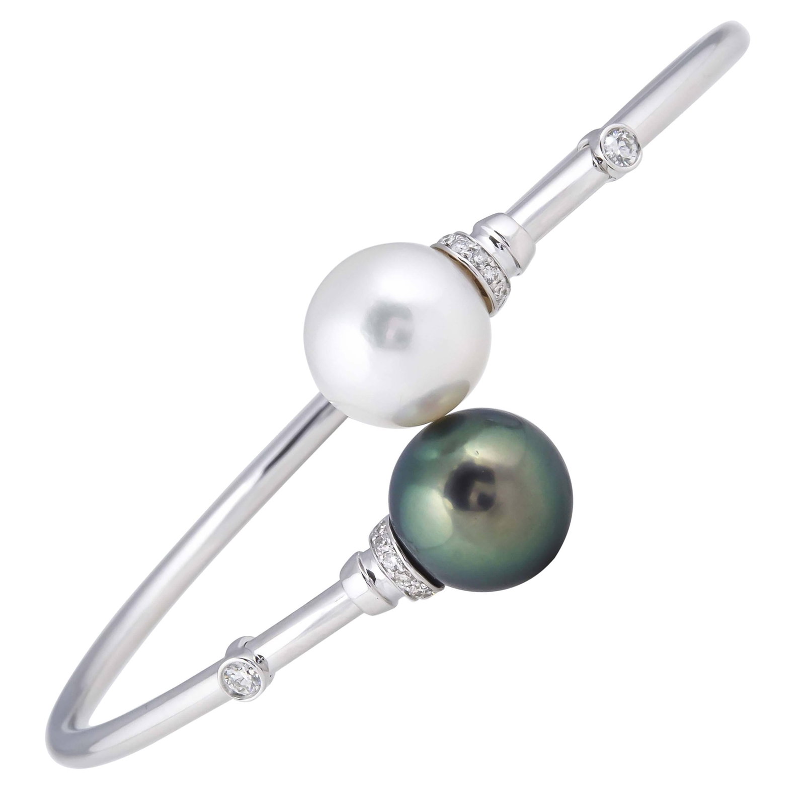 Harbor Diamonds 18K White Gold Pearl Diamond Bypass Bangle: Harbor Diamonds 18K White Gold Pearl Diamond Bypass Bangle This stunning bangle is crafted from 18K white gold and features a contemporary design that beautifully showcases both South Sea and Tahitian