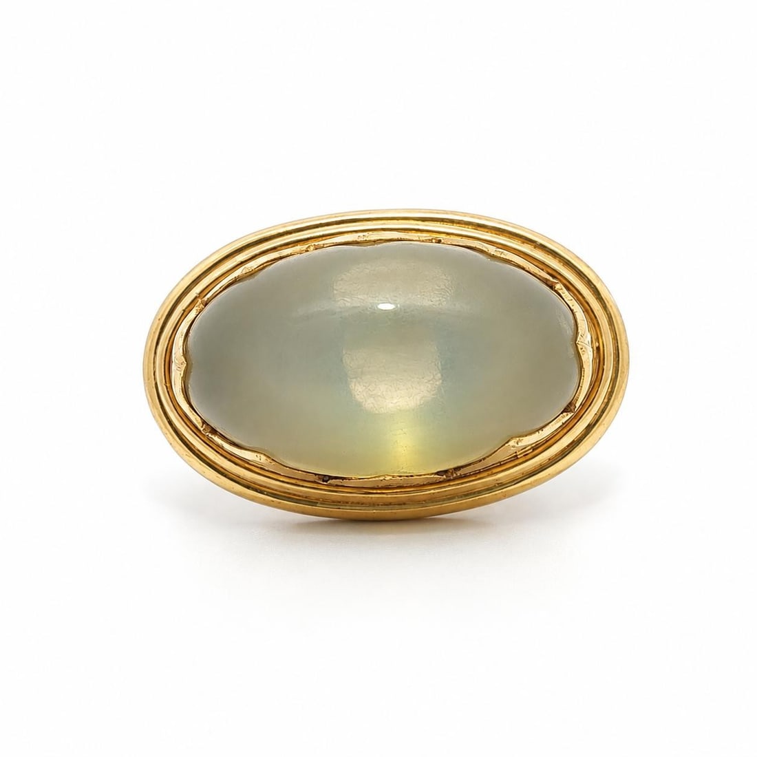 Unbranded Moonstone Cocktail Ring in 18k Gold and Sterling Silver: Unbranded Moonstone Cocktail Ring in 18k Gold and Sterling Silver Vintage cocktail ring featuring a natural genuine moonstone in an oval cabochon cut with a fancy triangular prong setting. Crafted in 