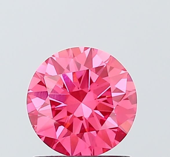 Loose Diamond - ROUND 1.02ct Fancy Vivid Pink VS1: Loose Diamond - ROUND 1.02ct Fancy Vivid Pink VS1 Source: This is a real non-mined Diamond that has been grown in a lab Shape: ROUND Carats: 1.02 Color: Fancy Vivid Pink Certification: IGI Video: