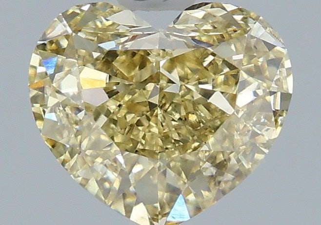 Loose Diamond - HEART 2.09ct Fancy Yellow VS1: Loose Diamond - HEART 2.09ct Fancy Yellow VS1 Source: This is a real non-mined Diamond that has been grown in a lab Shape: HEART Carats: 2.09 Color: Fancy Yellow Certification: IGI Video:
