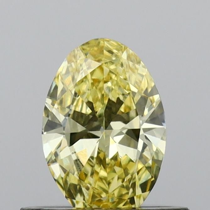 Loose Diamond - OVAL 0.44ct Fancy Vivid Yellow VS1: Loose Diamond - OVAL 0.44ct Fancy Vivid Yellow VS1 Source: This is a real non-mined Diamond that has been grown in a lab Shape: OVAL Carats: 0.44 Color: Fancy Vivid Yellow Certification: IGI Video:
