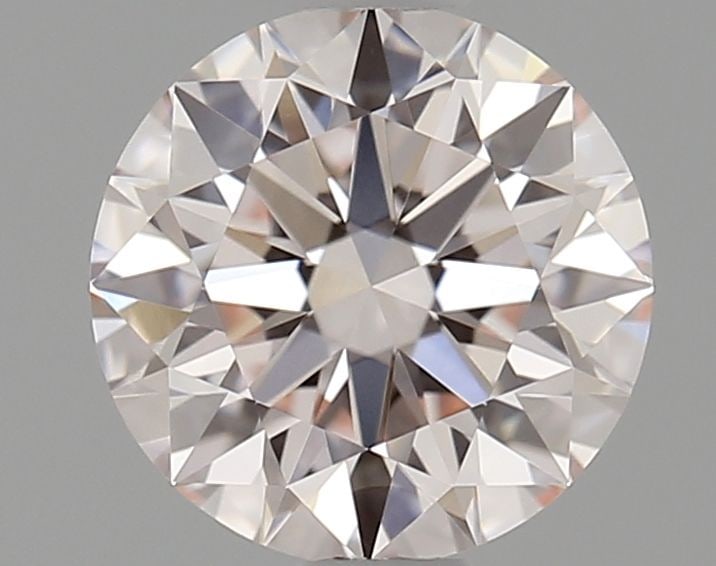 Ideal Loose Diamond - ROUND 0.72ct Fancy Pink VVS2: Ideal Loose Diamond - ROUND 0.72ct Fancy Pink VVS2 Source: This is a real non-mined Diamond that has been grown in a lab Shape: ROUND Carats: 0.72 Color: Fancy Pink Certification: IGI Video: